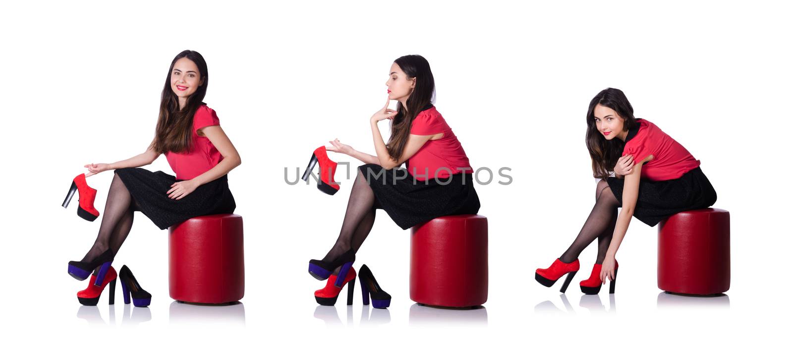 Woman trying new shoes isolated on the white by Elnur