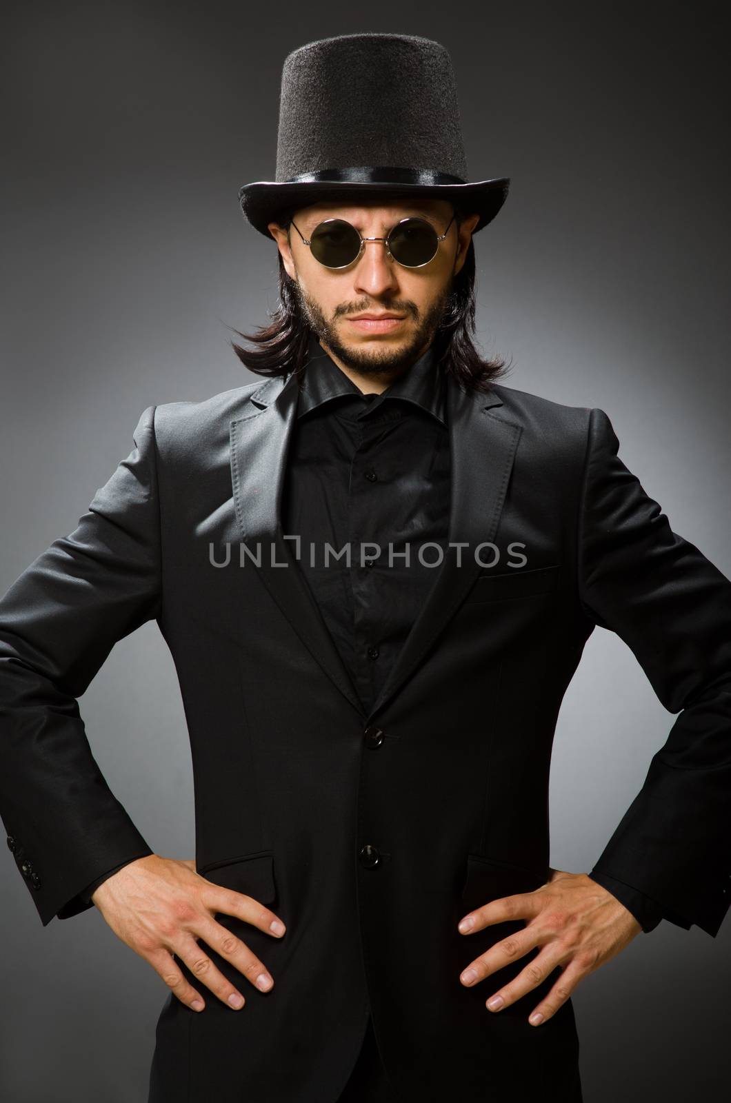 Vintage concept with man wearing black top hat by Elnur