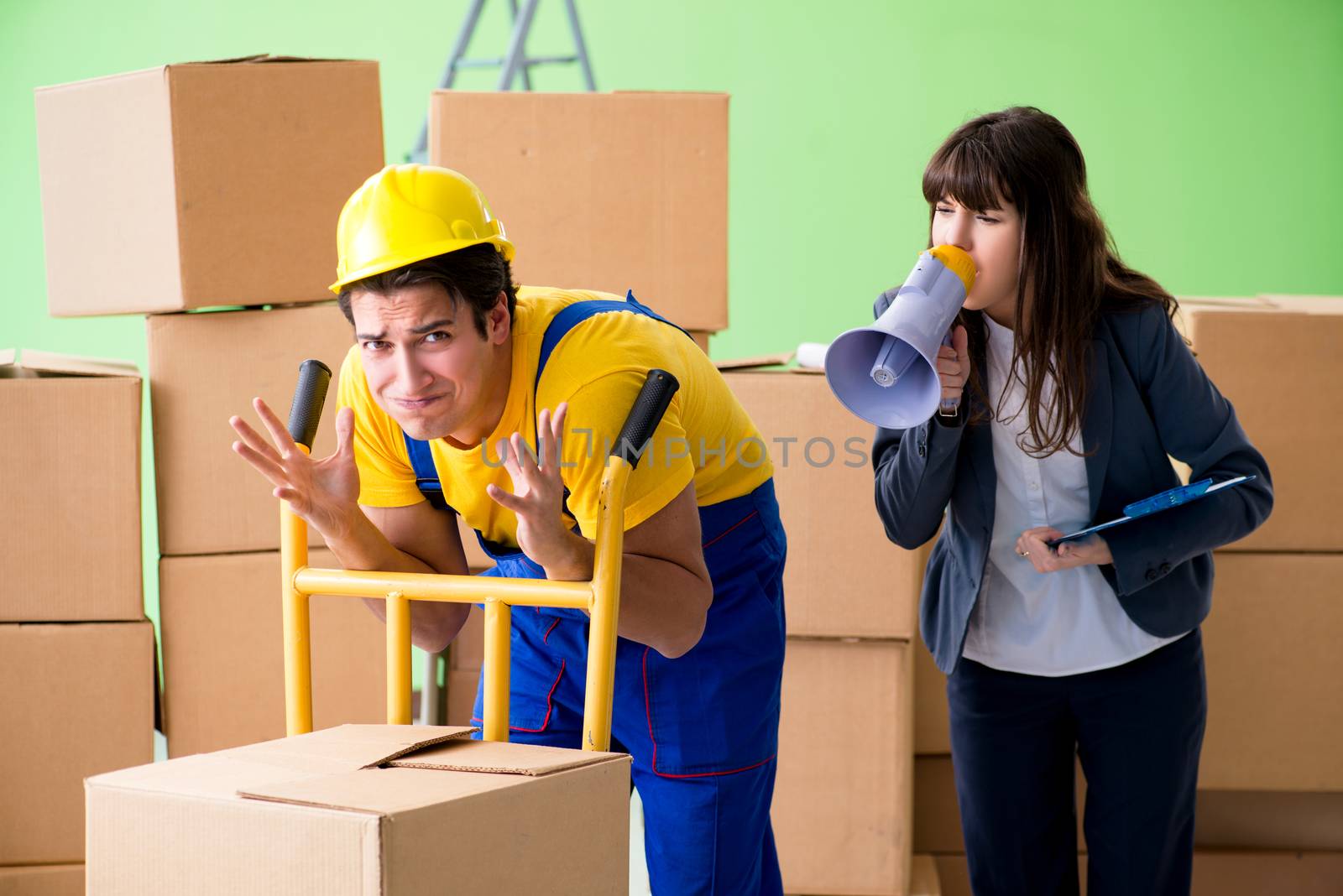 Woman boss and man contractor working with boxes delivery