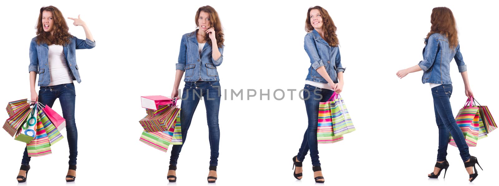 Young woman with shopping bags isolated on white by Elnur
