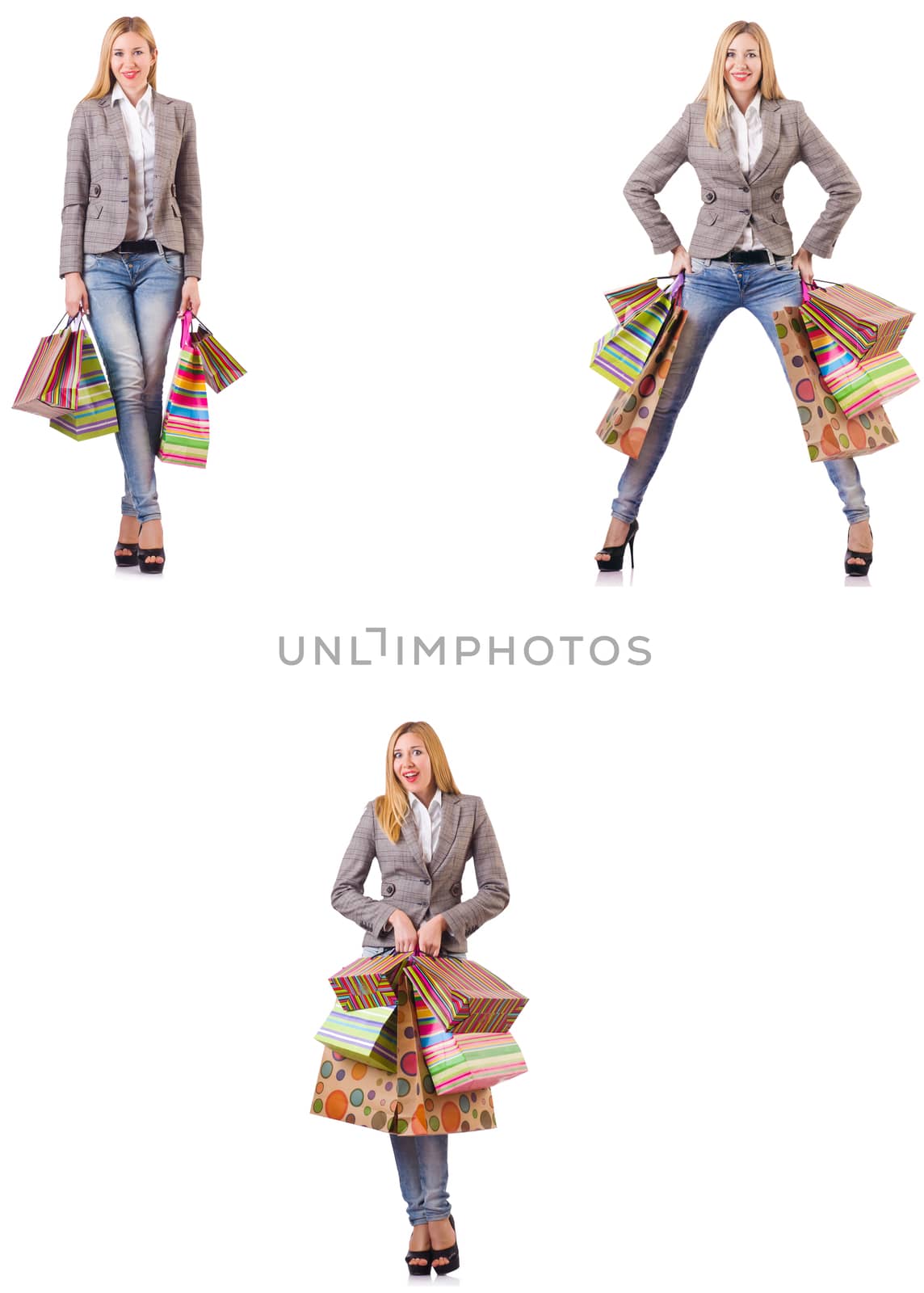 Beautiful woman with shopping bags isolated on white by Elnur