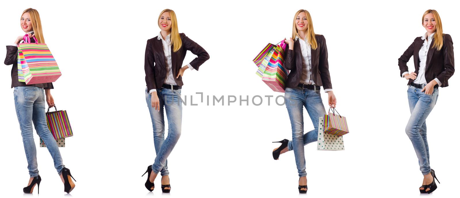 Beautiful woman with shopping bags isolated on white by Elnur