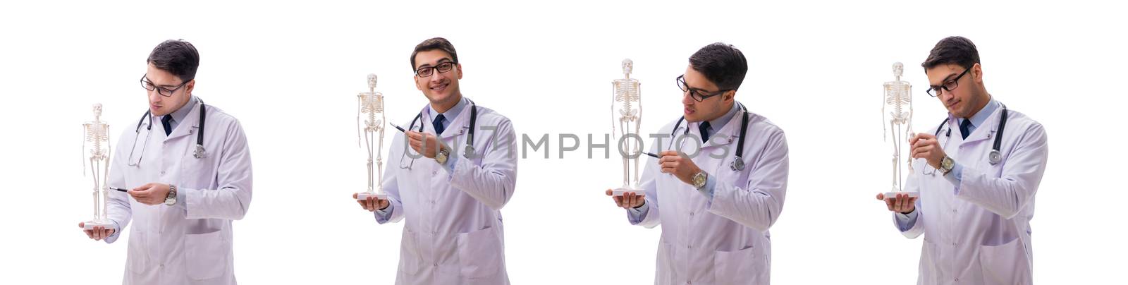 Young male doctor with skeleton isolated on white