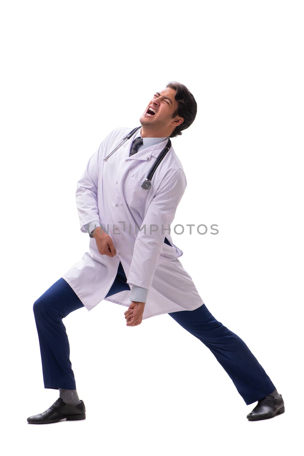 Young handsome doctor under pressure isolated on white