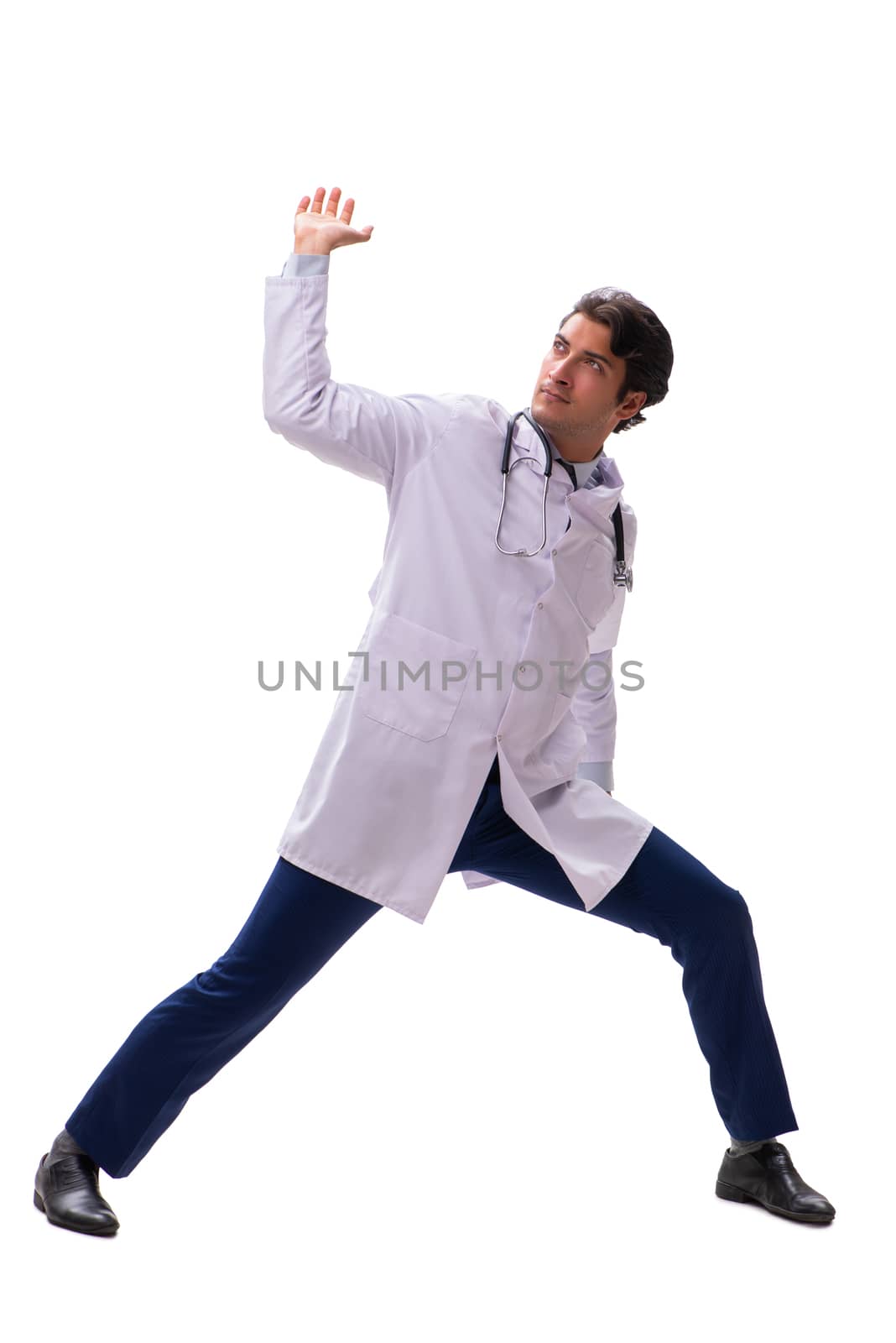 Young handsome doctor under pressure isolated on white