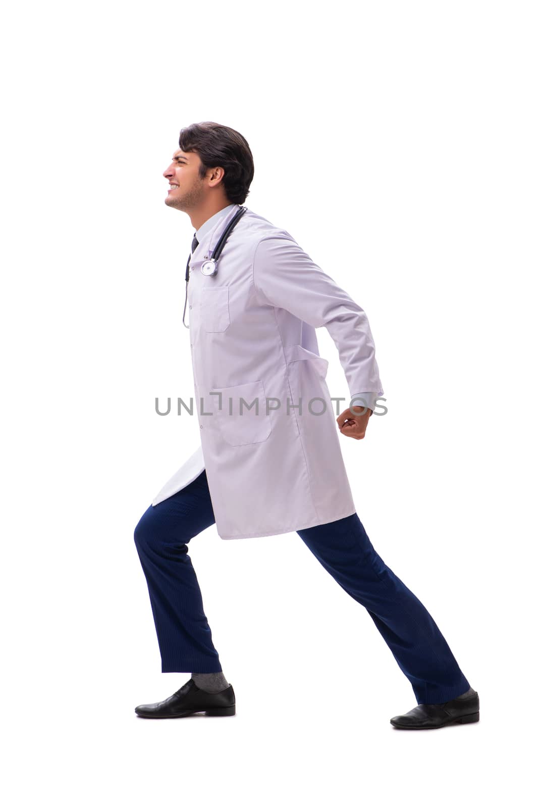 Young handsome doctor under pressure isolated on white