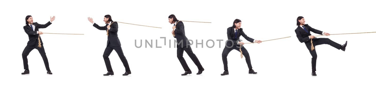 Young businessman pulling rope isolated on white