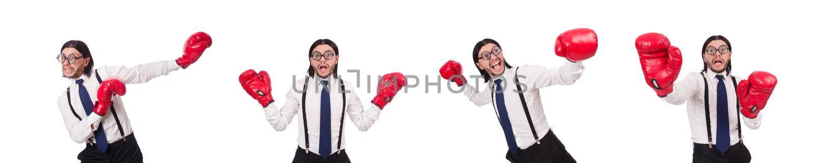 Funny young  businessman with boxing gloves isolated on white