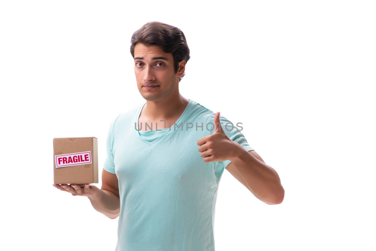 Young handsome man with fragile box ordered from Internet 