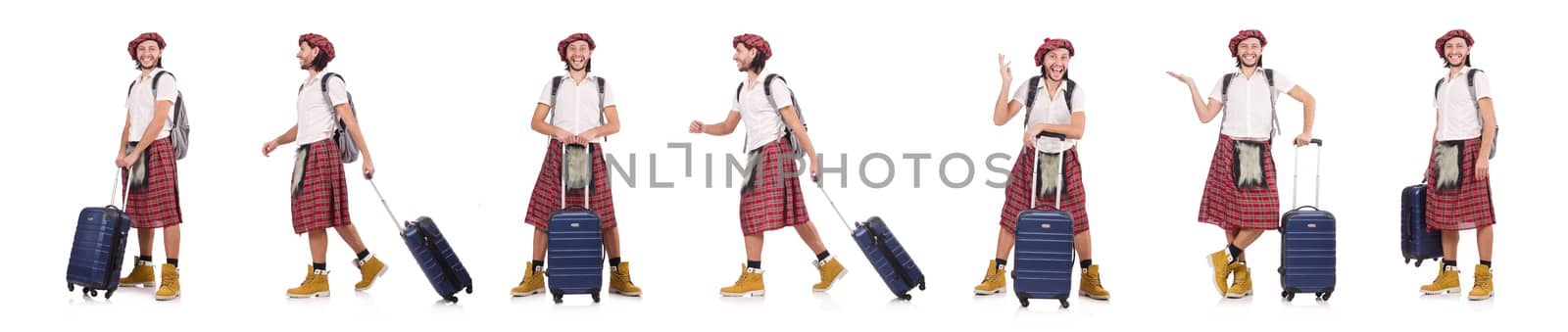 Man in scottish skirt with suitcase isolated on white