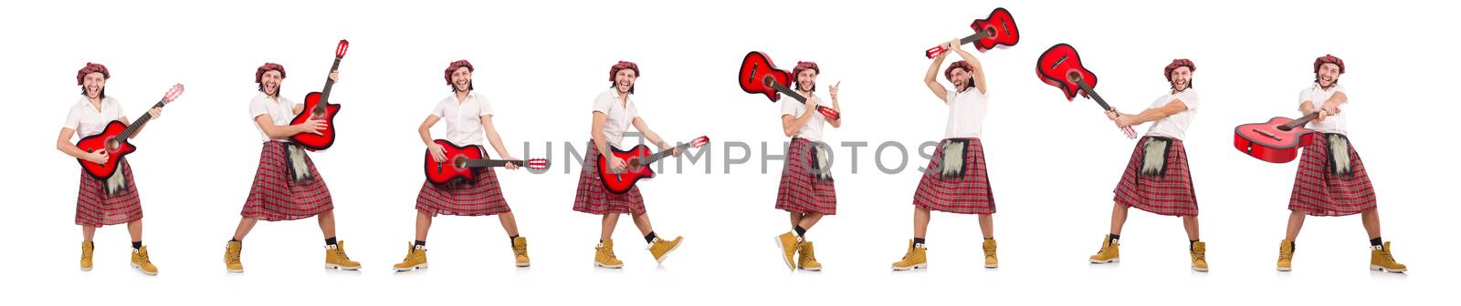 Scotsman playing guitar isolated on white