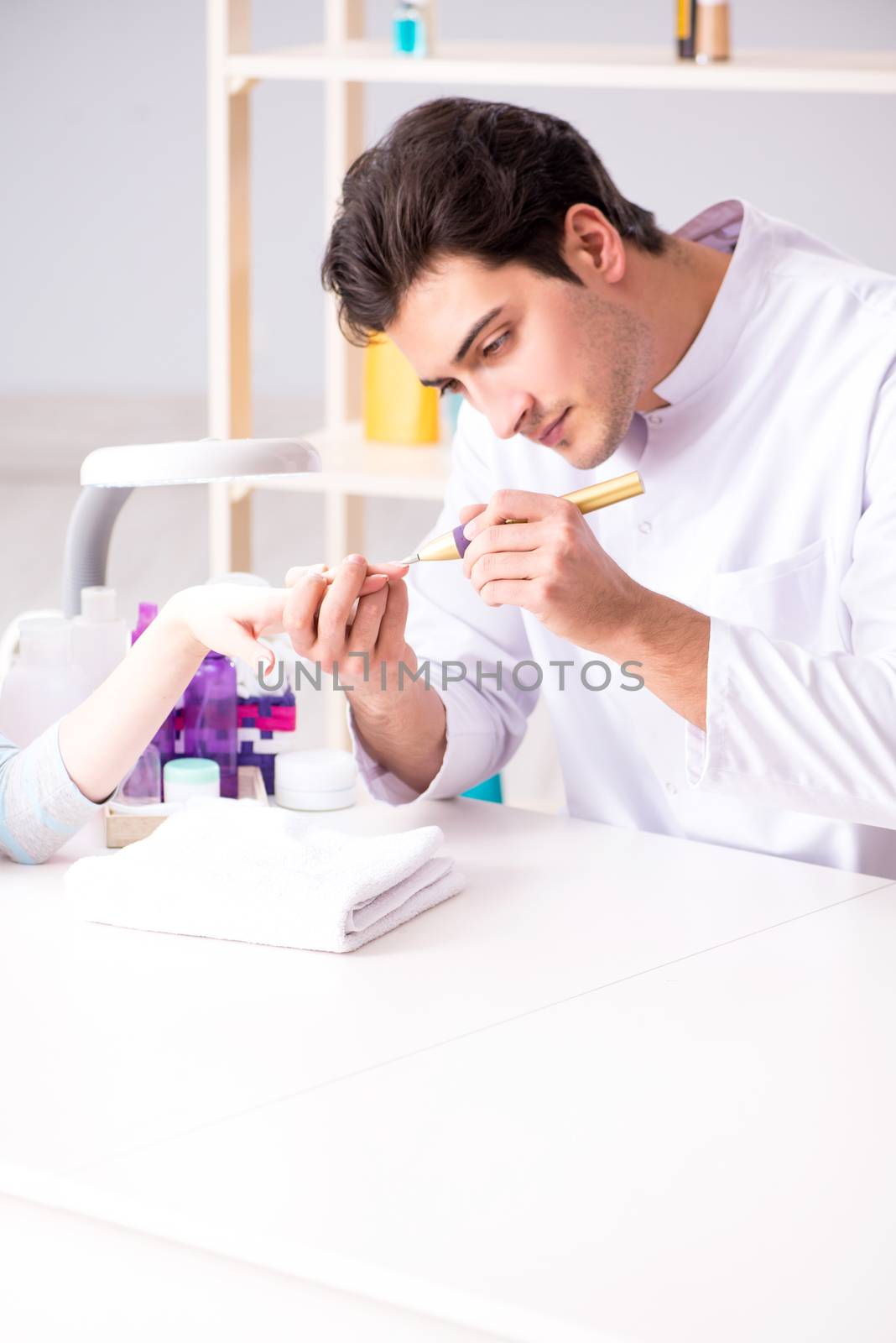 Hands during manicure care session