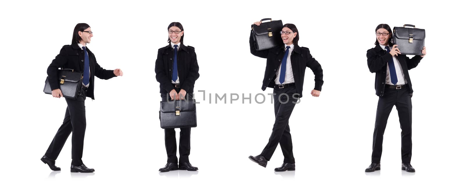 Young businessman holding briefcase isolated on white by Elnur