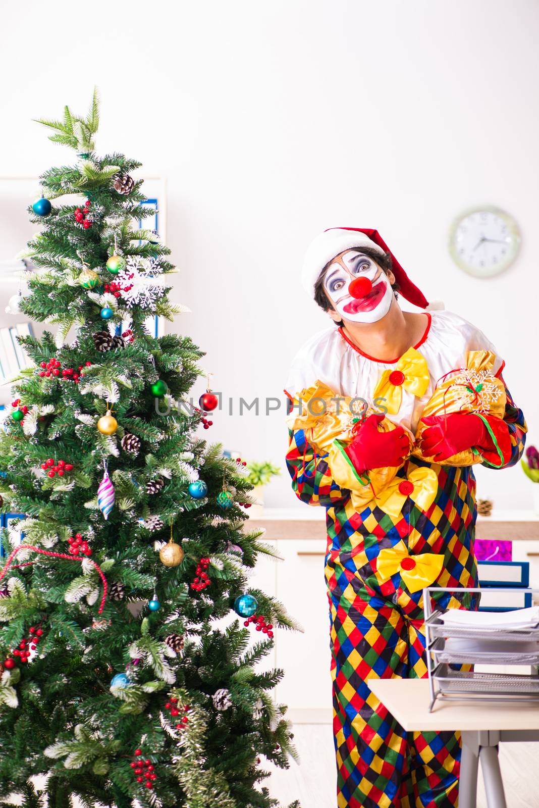 Funny clown in Christmas celebration concept 