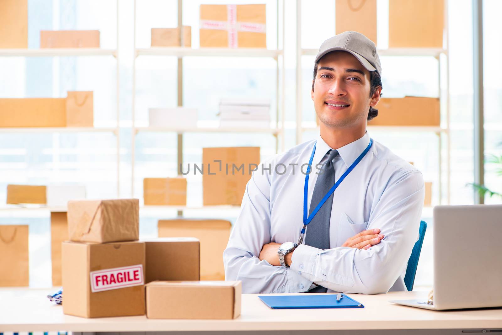 Male employee working in box delivery relocation service