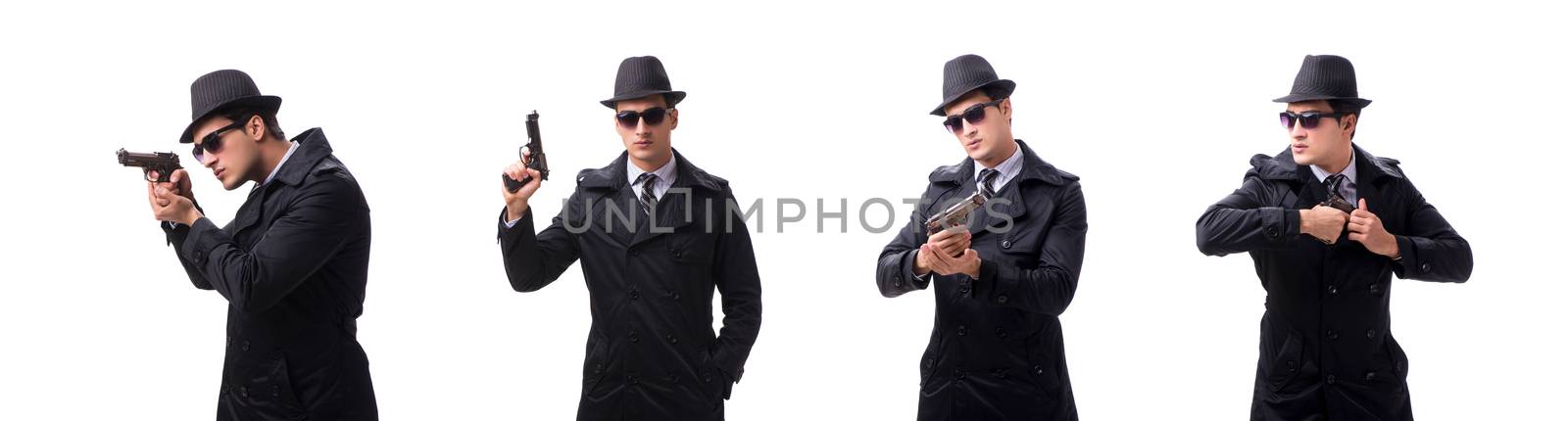 Man spy with handgun isolated on white background by Elnur