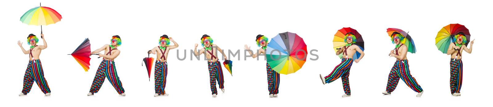 Clown with umbrella isolated on white by Elnur