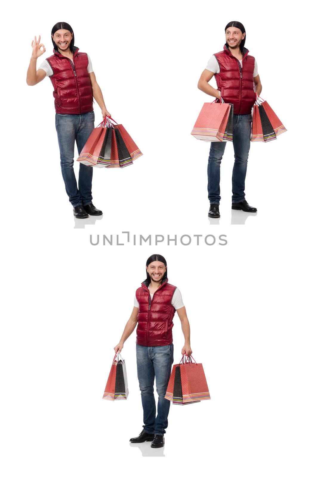 Man with shopping bags isolated on white by Elnur