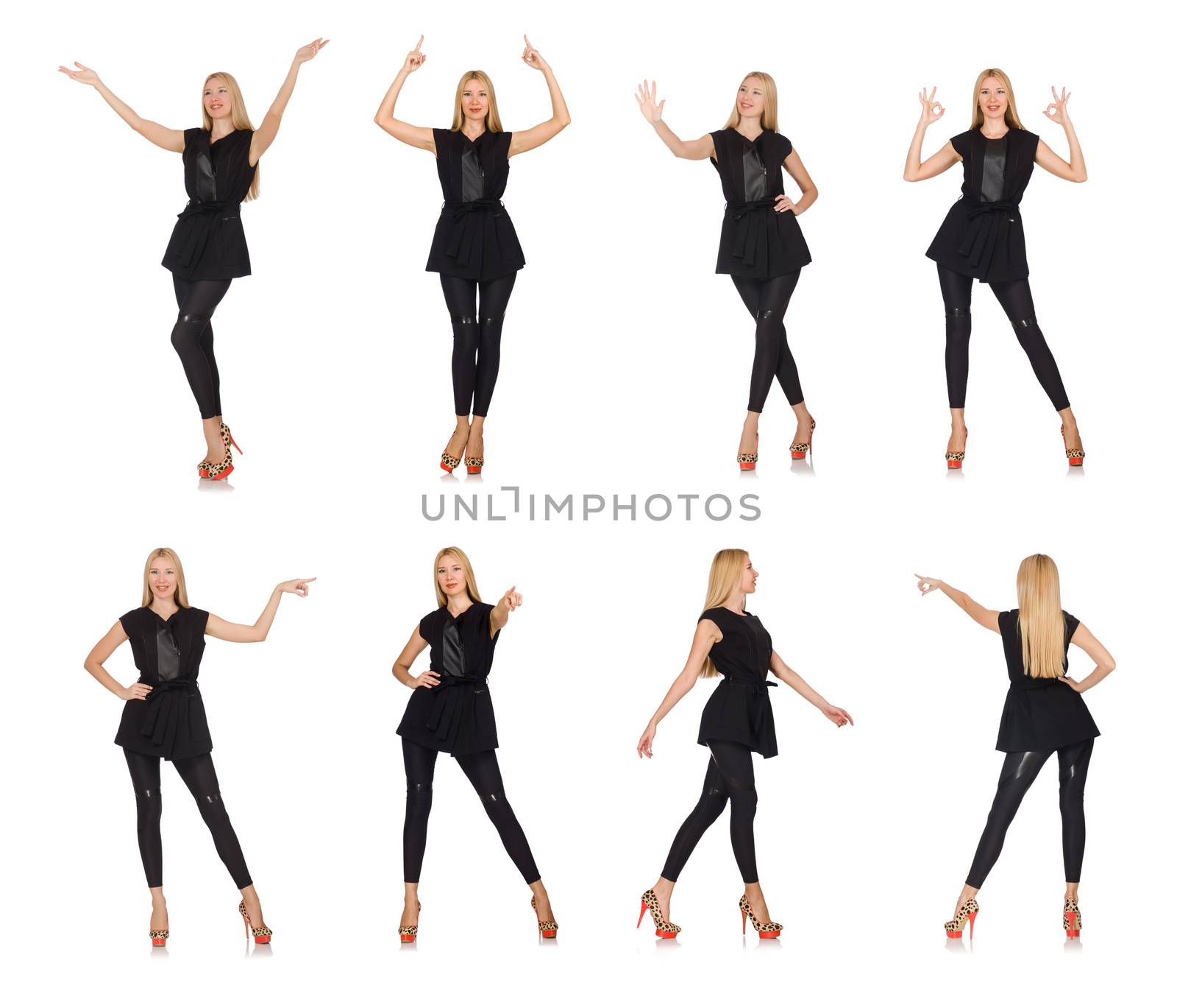Pretty woman in tight black pants isolated on white