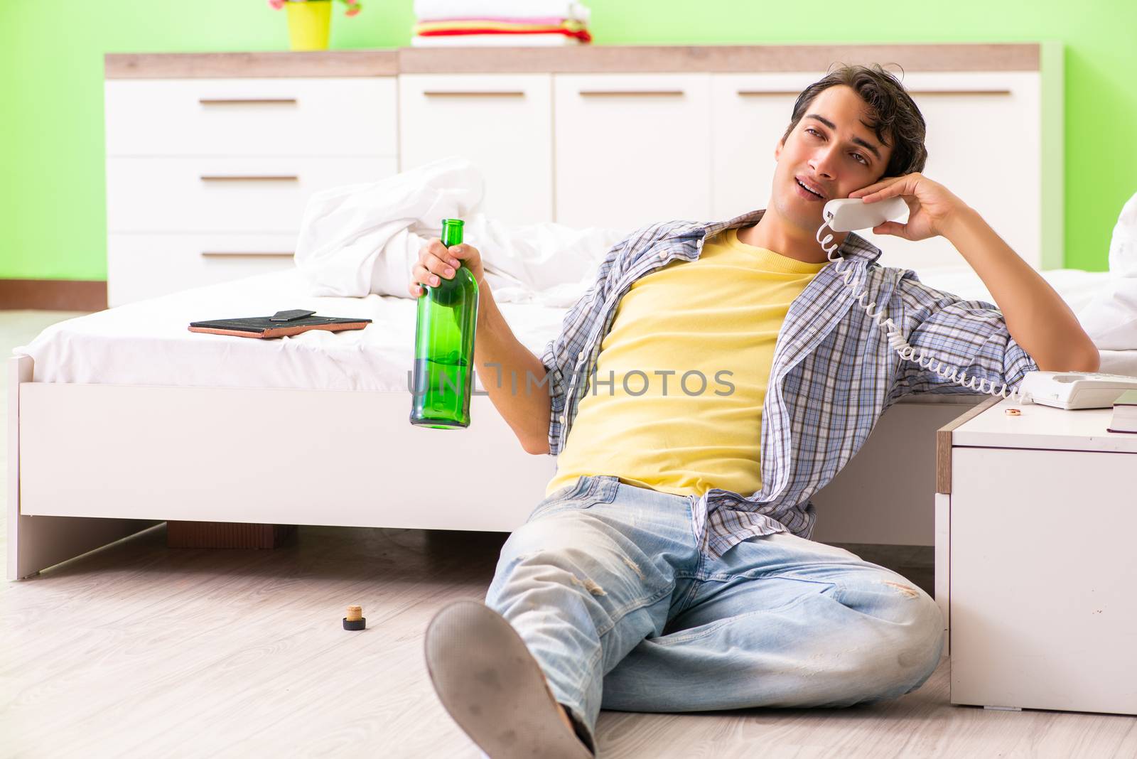 Young man sad in unhappy love concept