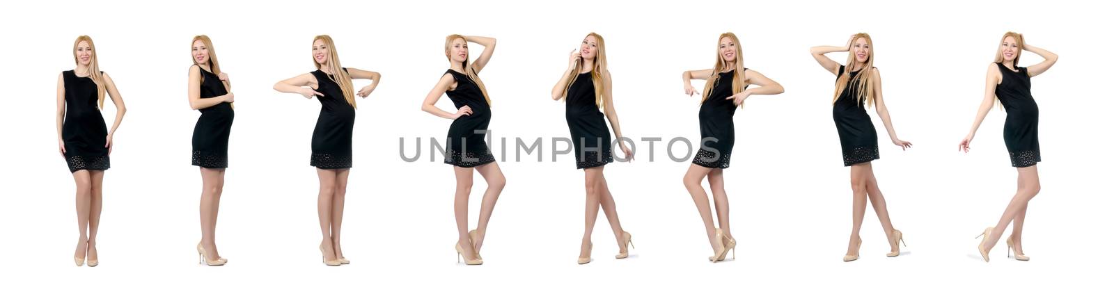 Pretty pregnant woman in mini black dress isolated on white by Elnur