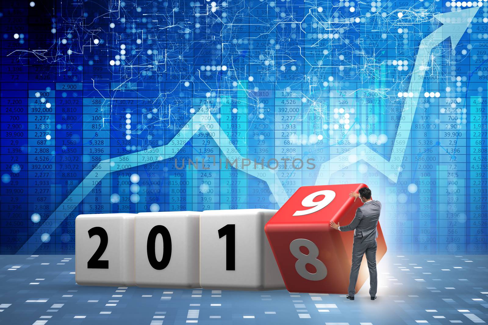 Businessman employee rotating cube to reveal number 2019