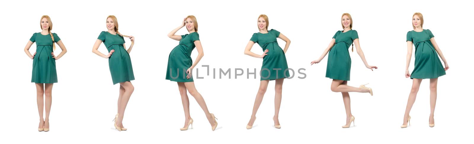 Beautiful pregnant woman in green dress isolated on white by Elnur