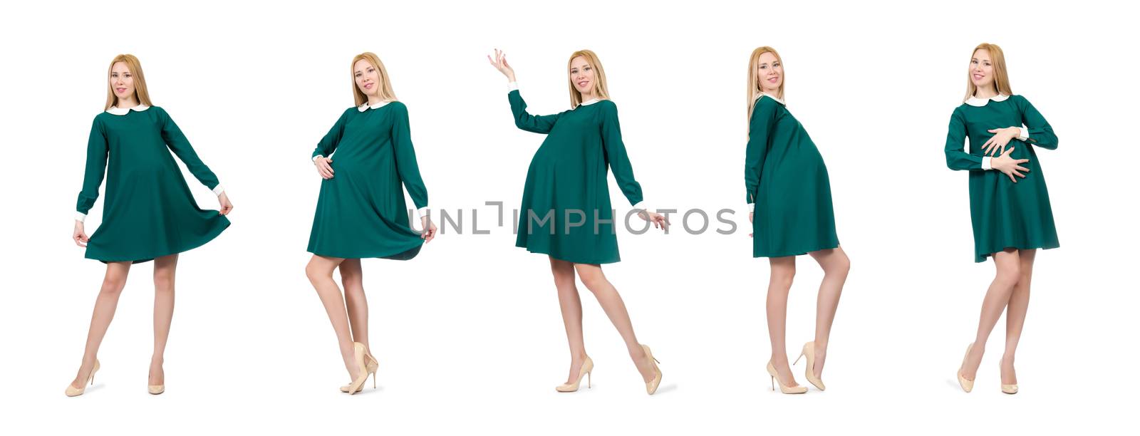 Beautiful pregnant woman in green dress isolated on white by Elnur