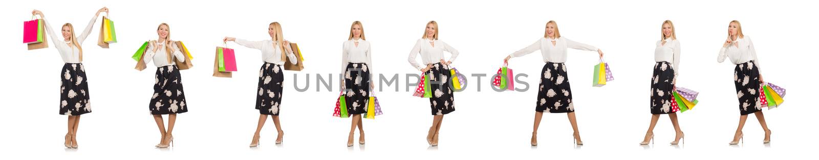 Woman with shopping bags isolated on white