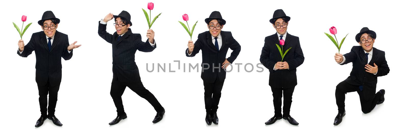 Young man in black costume with flower isolated on white by Elnur