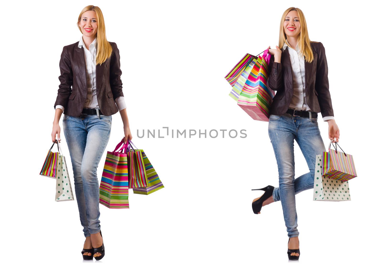 Beautiful woman with shopping bags isolated on white