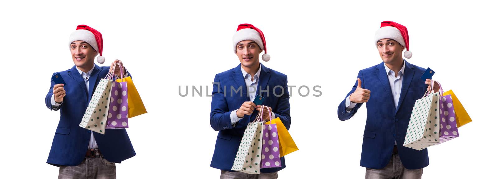 Young man with bags after christmas shopping on white background 
