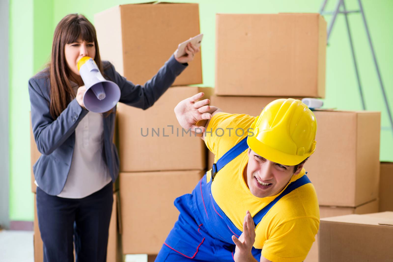 Woman boss and man contractor working with boxes delivery