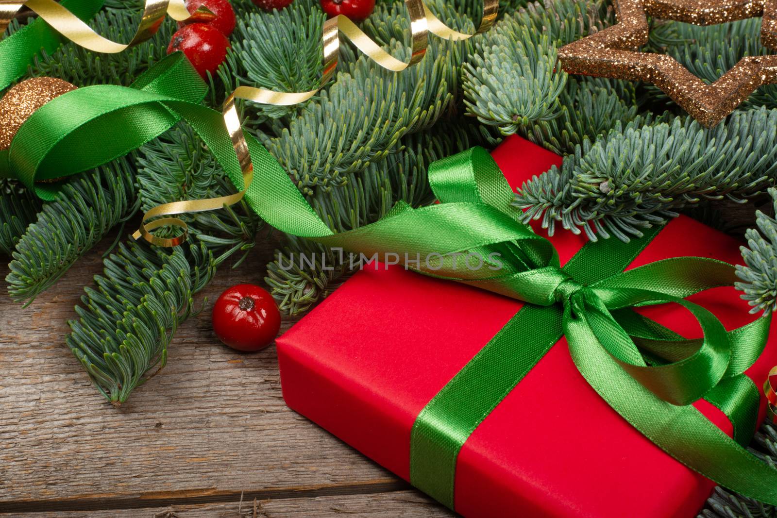 Christmas gift and fir branches by destillat