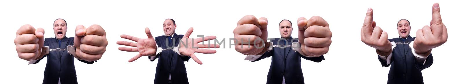 Businessman with handcuffs on white