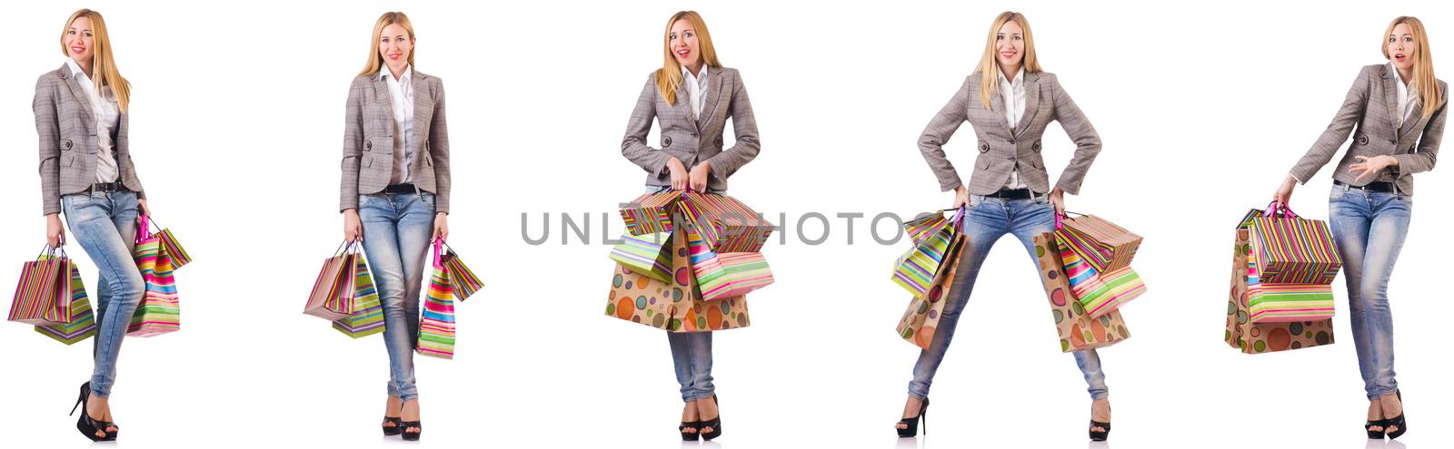 Beautiful woman with shopping bags isolated on white