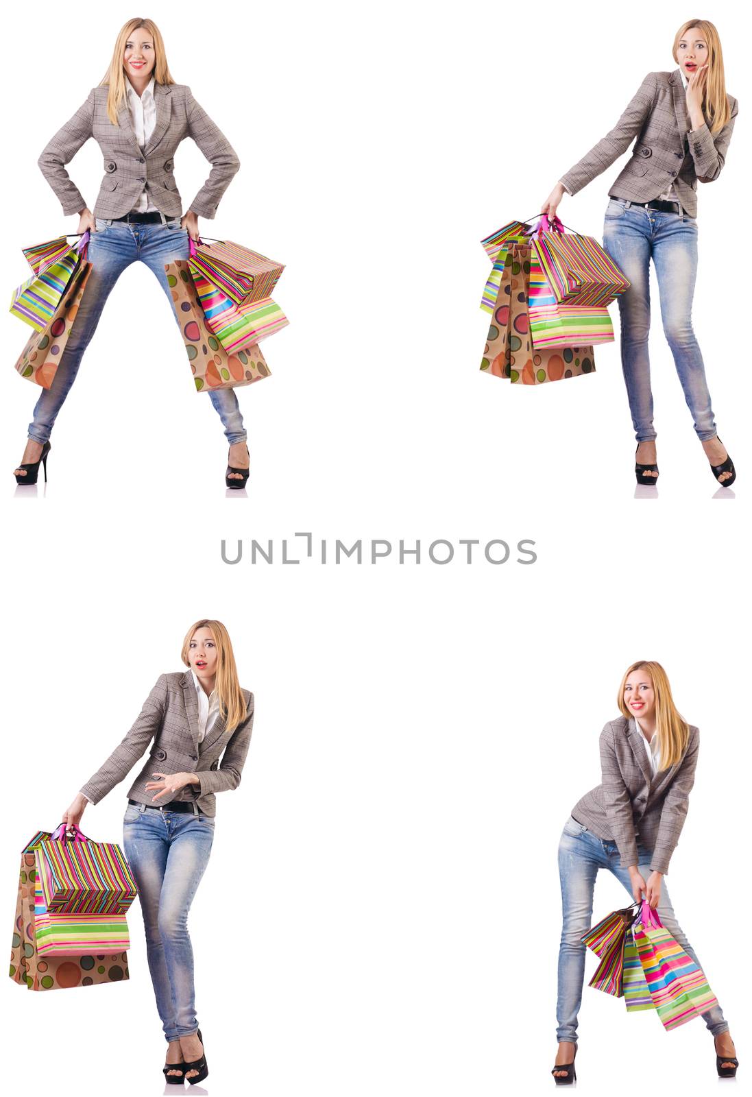 Beautiful woman with shopping bags isolated on white by Elnur