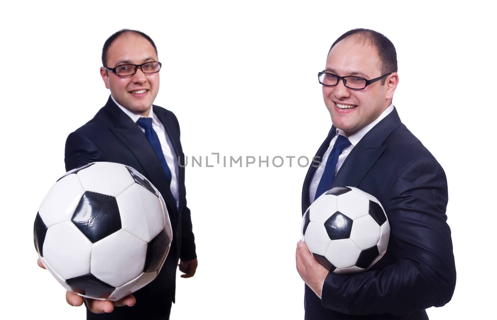 Businessman with football on white