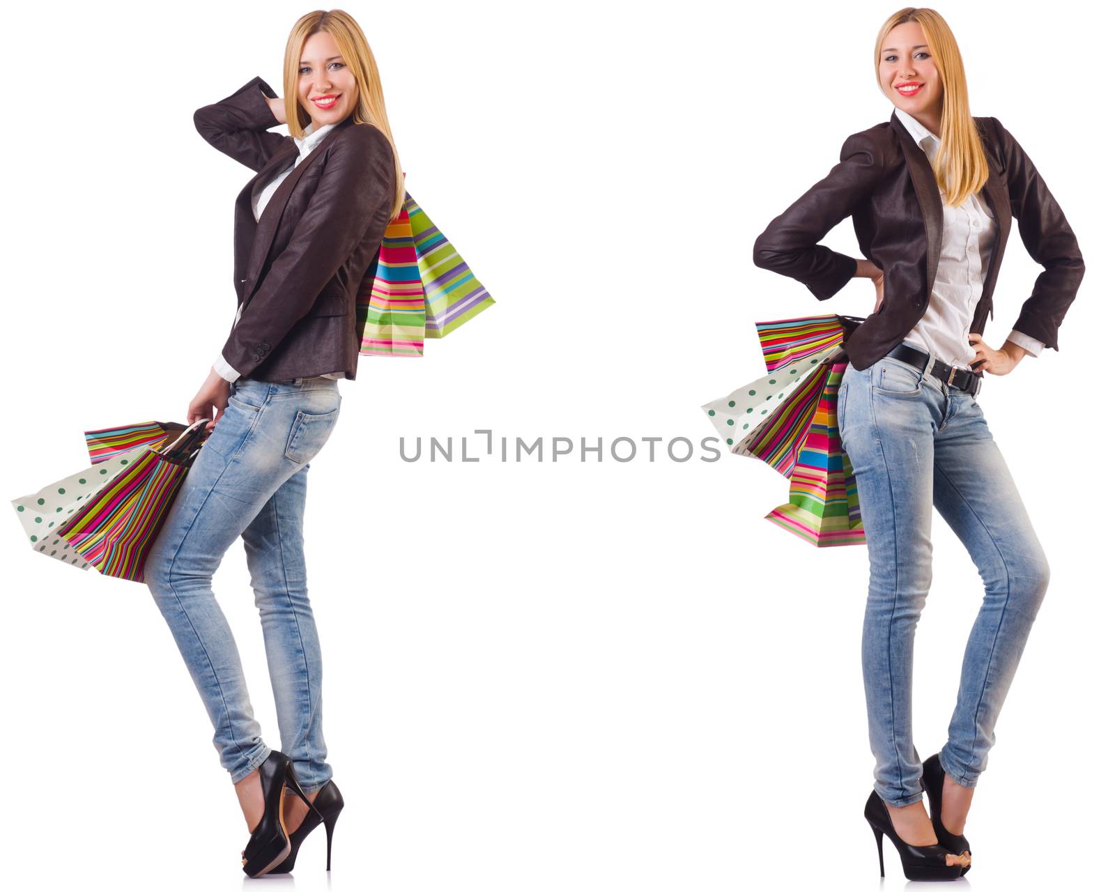 Beautiful woman with shopping bags isolated on white by Elnur