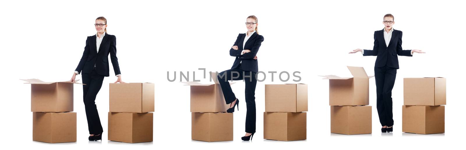 Businesswoman with boxes isolated on white by Elnur