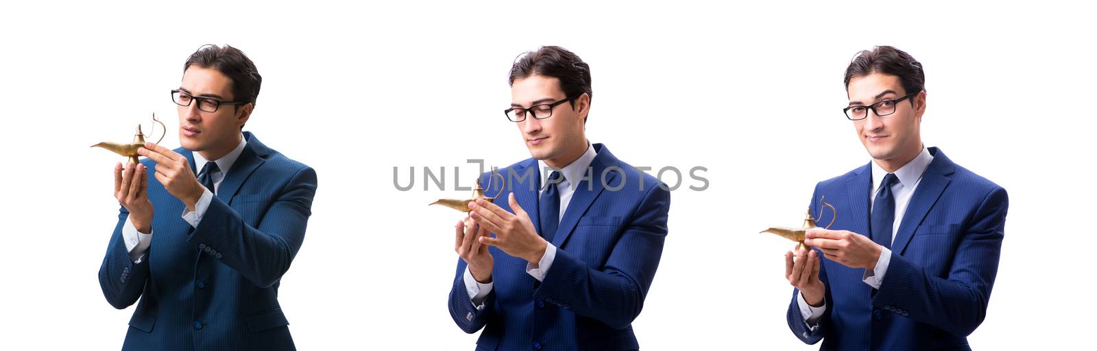 Businessman with magic lamp isolated on white