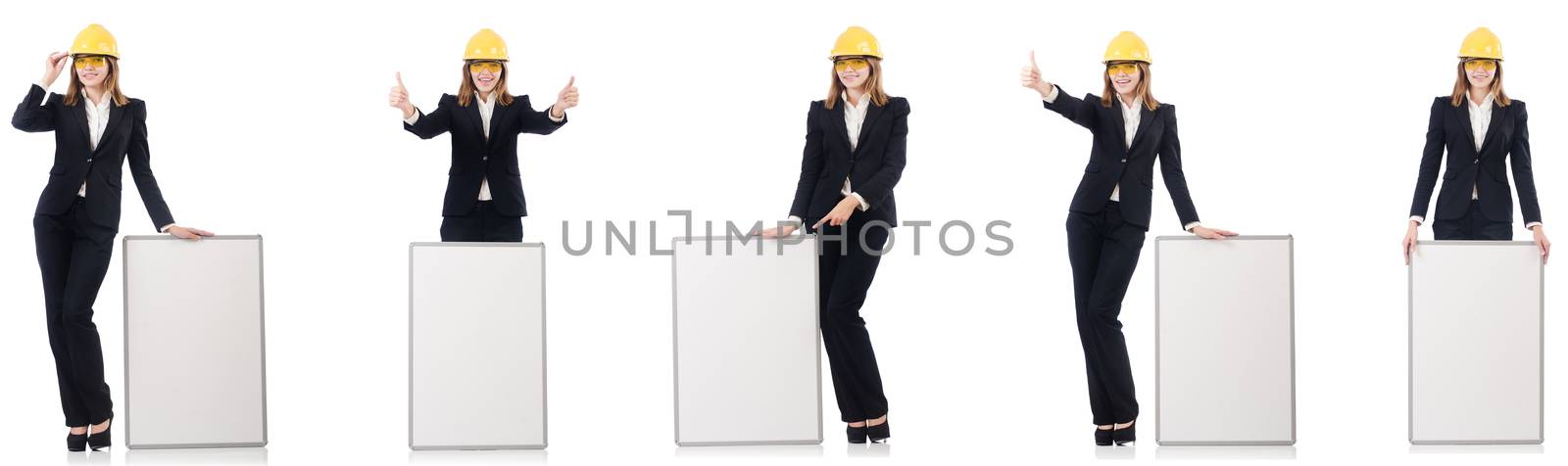 Young female builder with whiteboard 