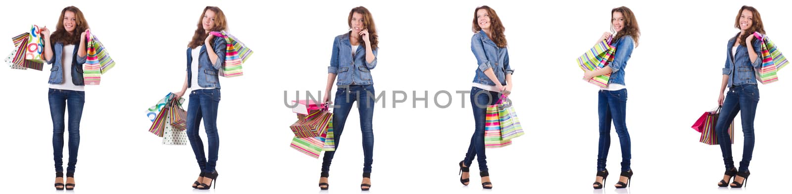 Young woman with shopping bags isolated on white 