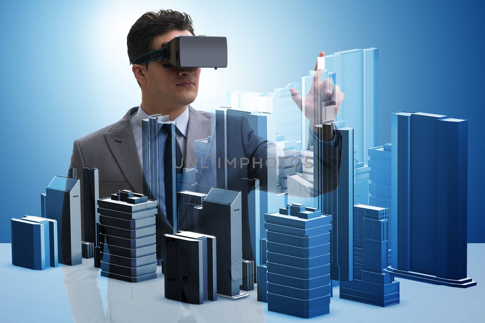 Man with virtual reality goggles doing urban planning