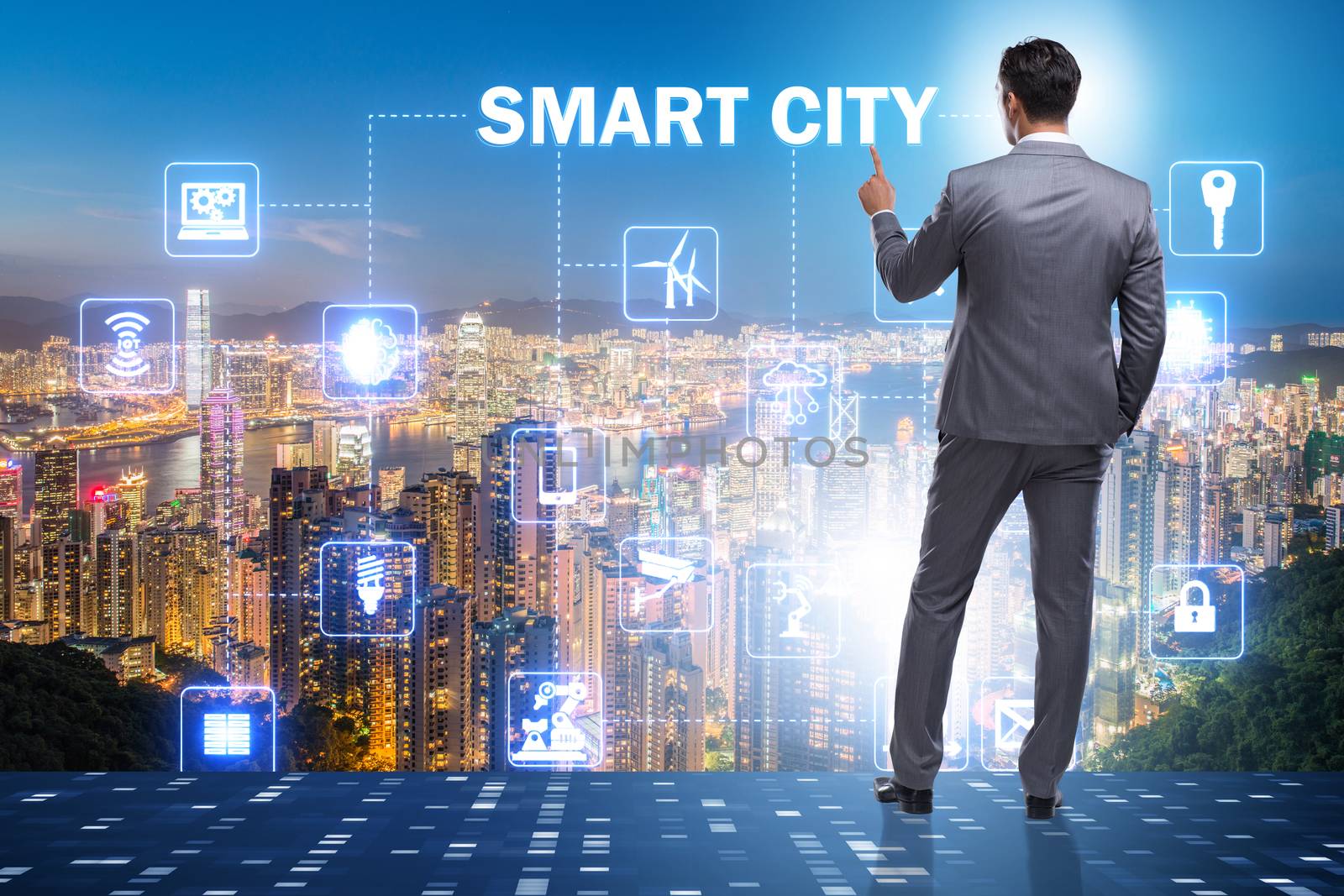 Concept of smart city with businessman pressing buttons