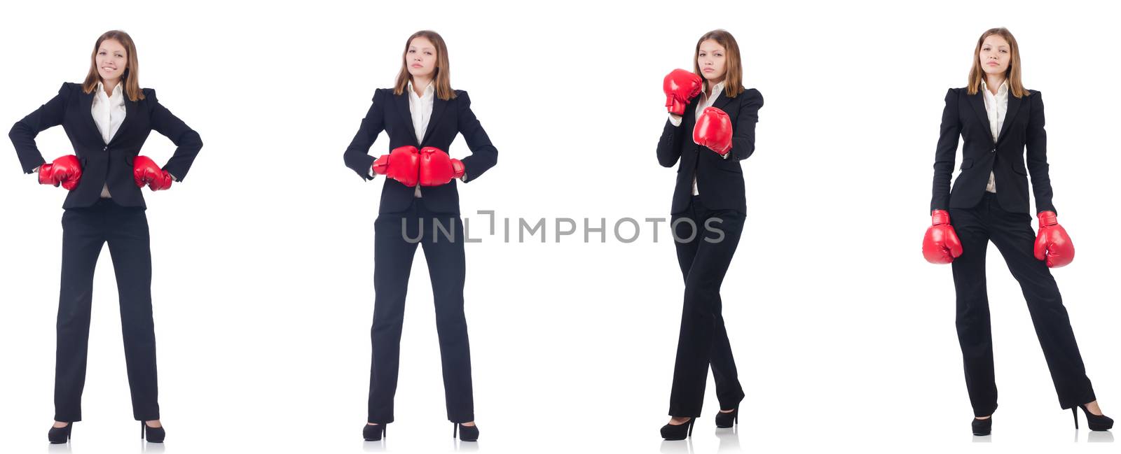 Businesswoman with boxing gloves isolated on white  by Elnur