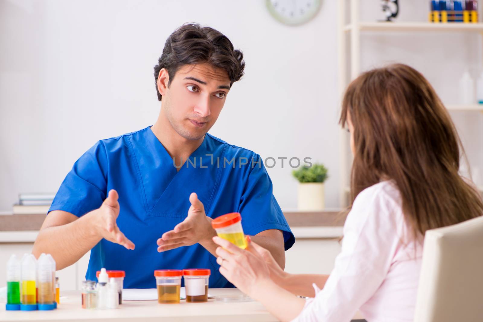 Patient visiting doctor for urine test