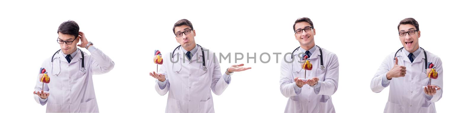 Young doctor with heart shape isolated on white by Elnur