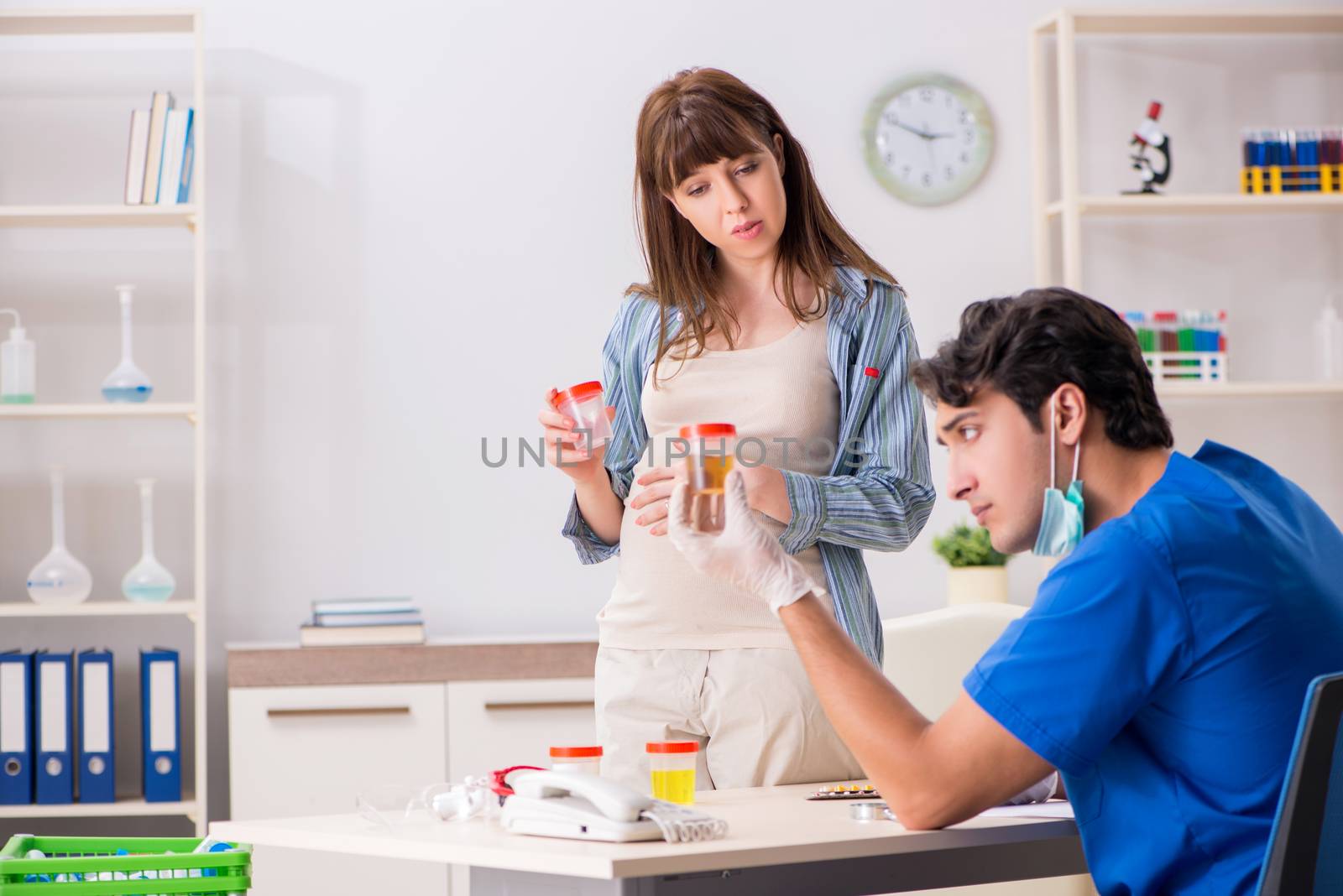 Pregnant woman visiting doctor for check-up