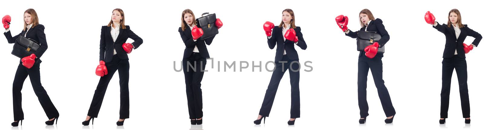 Businesswoman with boxing gloves isolated on white